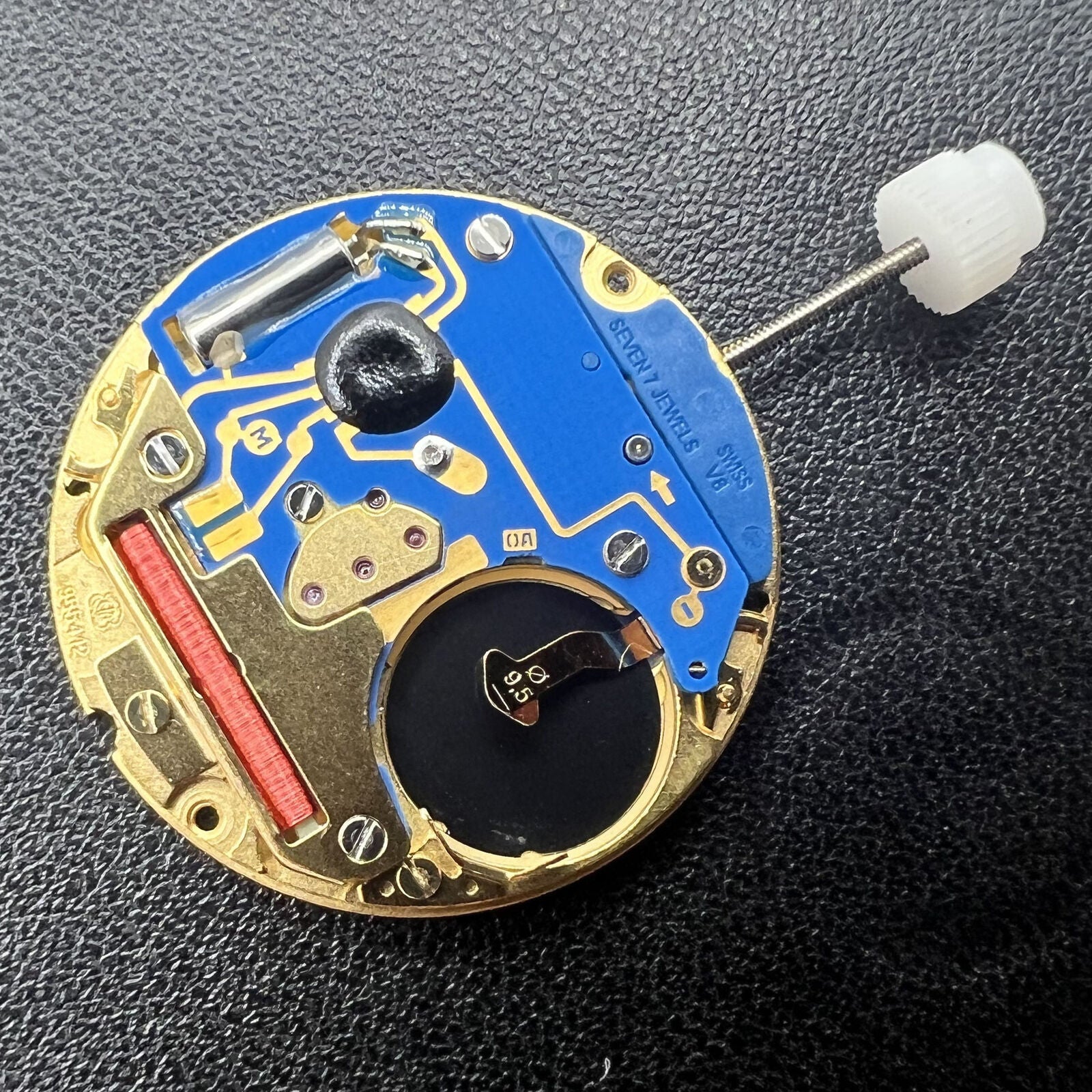 ETA 955.412 quartz watch movement with 3 hands and date window at 3 o'clock, precision timekeeping by ETA.