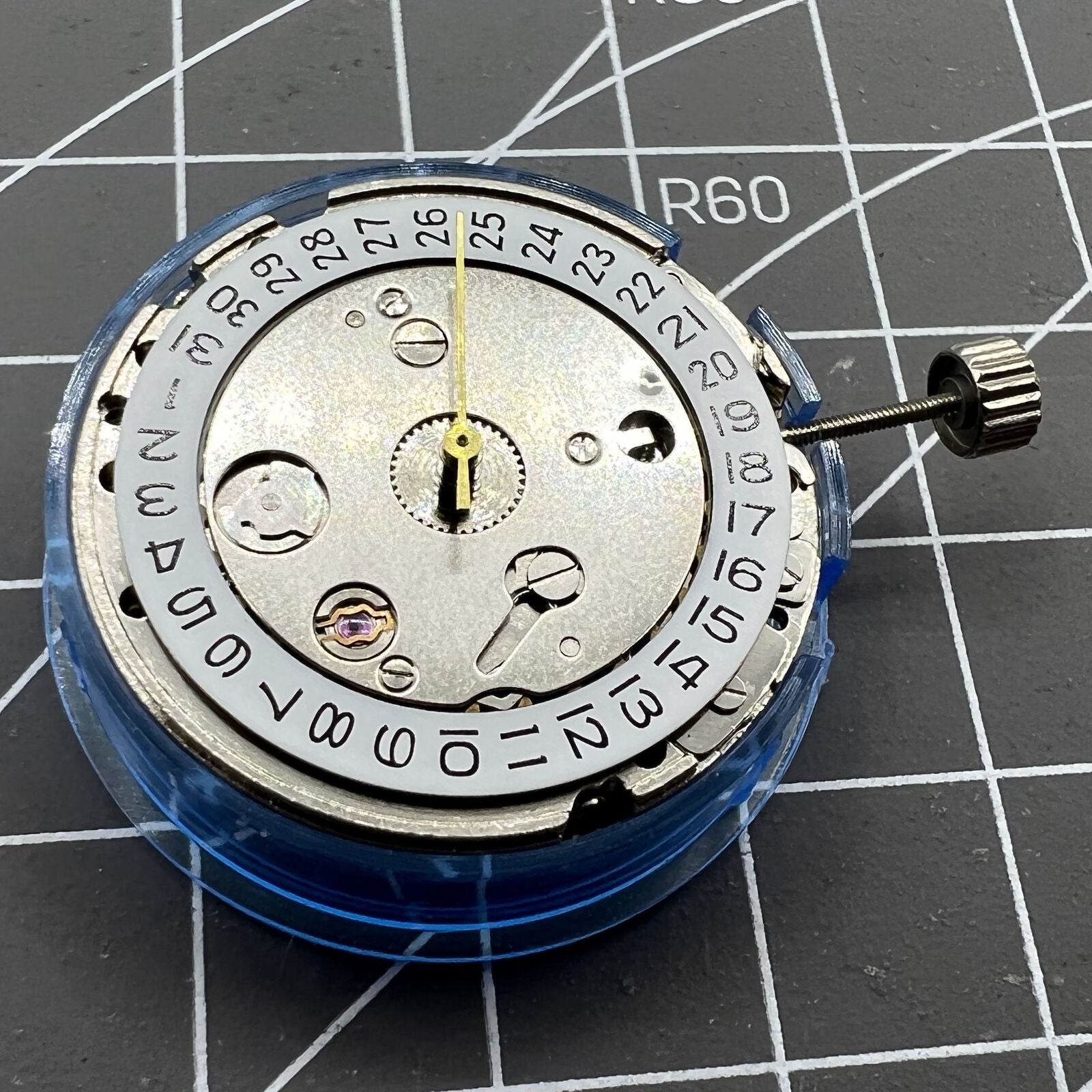 ST1612 mechanical automatic watch movement showcasing calendar display and precision gears.