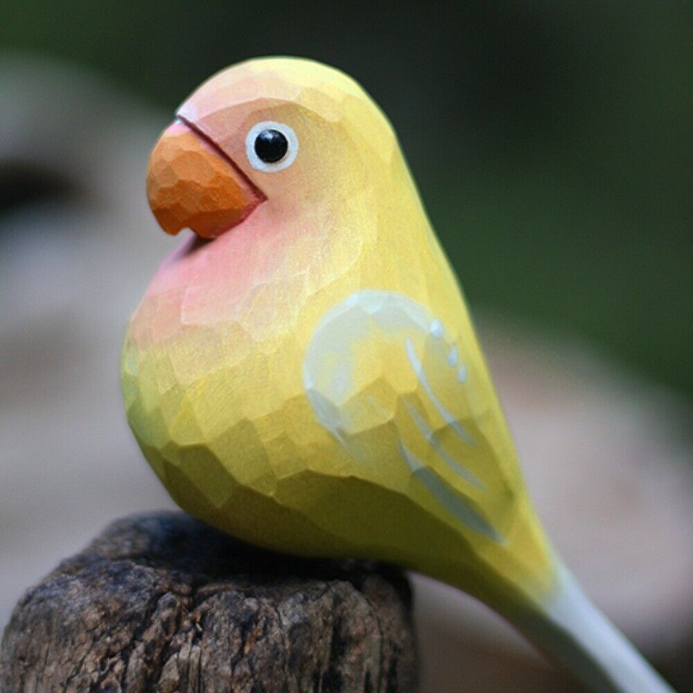 Handmade wooden Agapornis Fischeri figurine in green and yellow, decorative watch accessory.