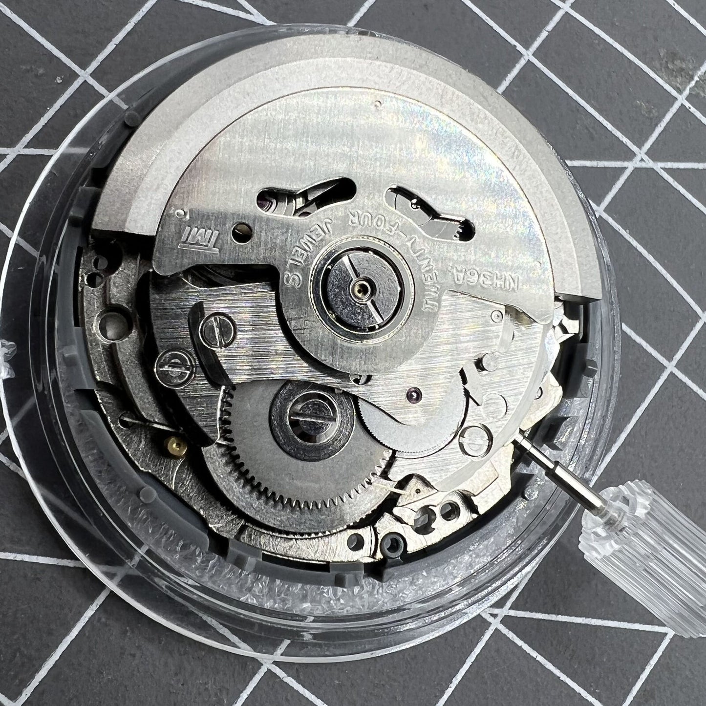 NH36 automatic watch with black Arabic dial, date display, and 3.8 crown position.