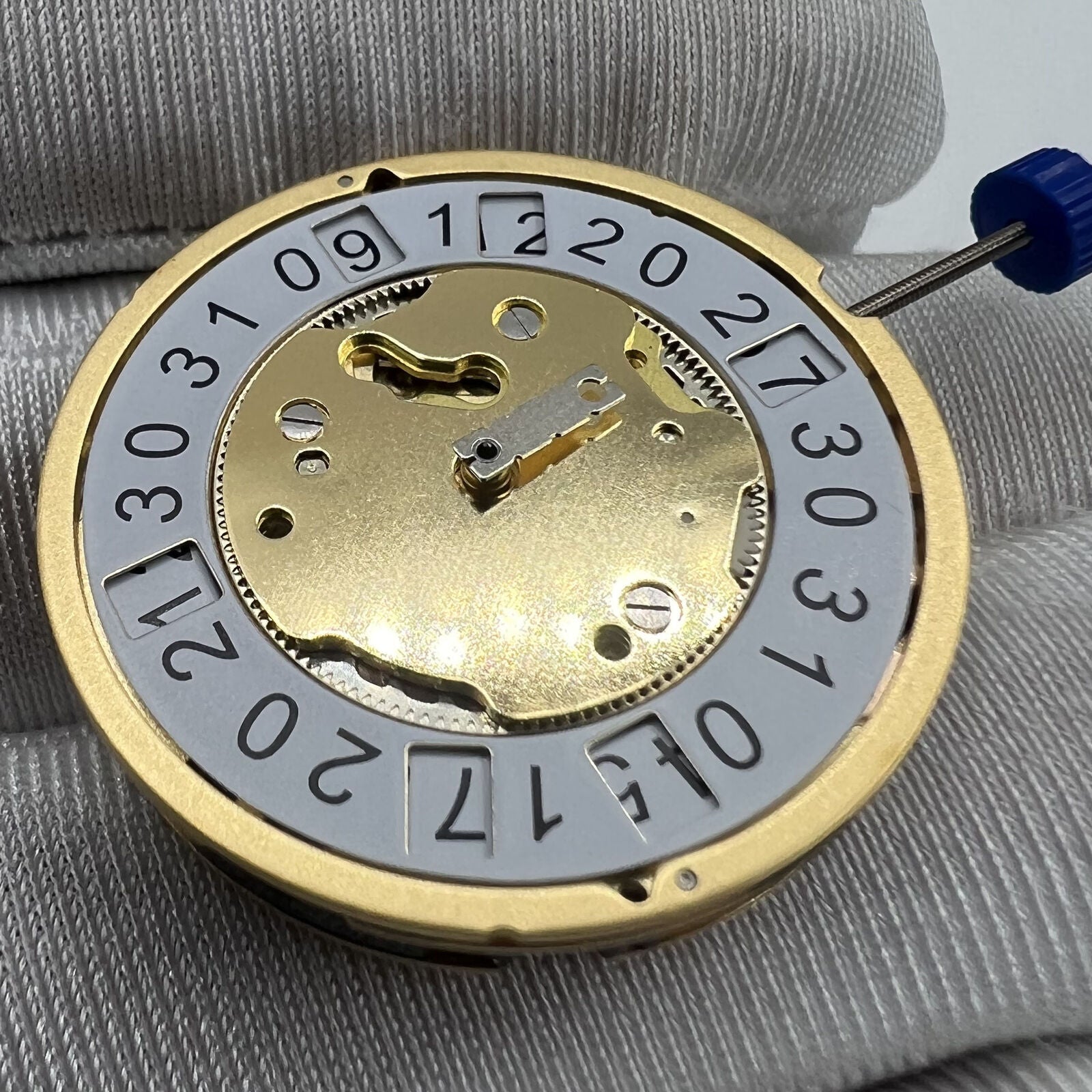 Swiss Ronda 4003B quartz watch movement with date feature at 12, precision Swiss made for accessories.
