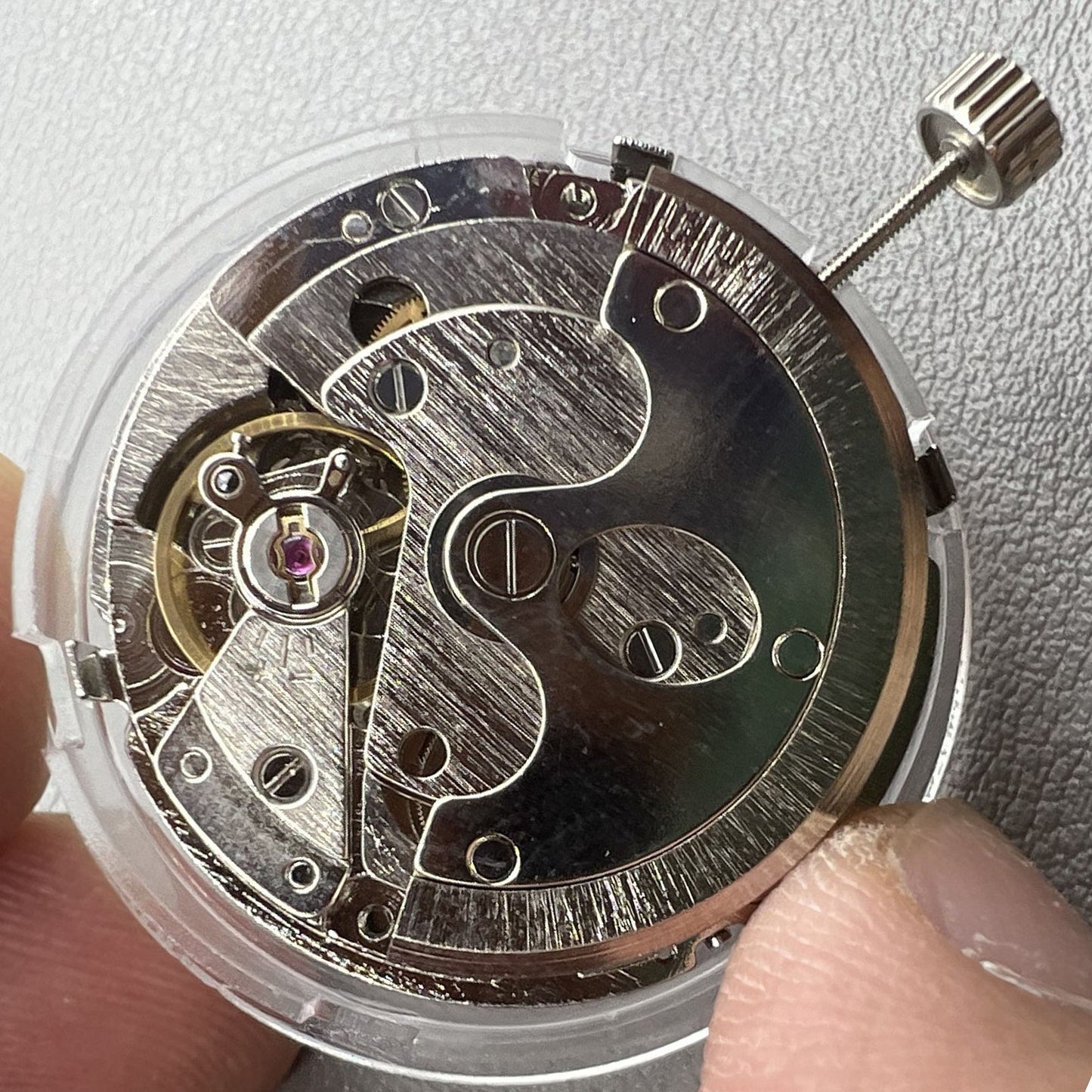 Seagull ST16 automatic watch with large date, three hands, and three chronograph subdials, stylish design.