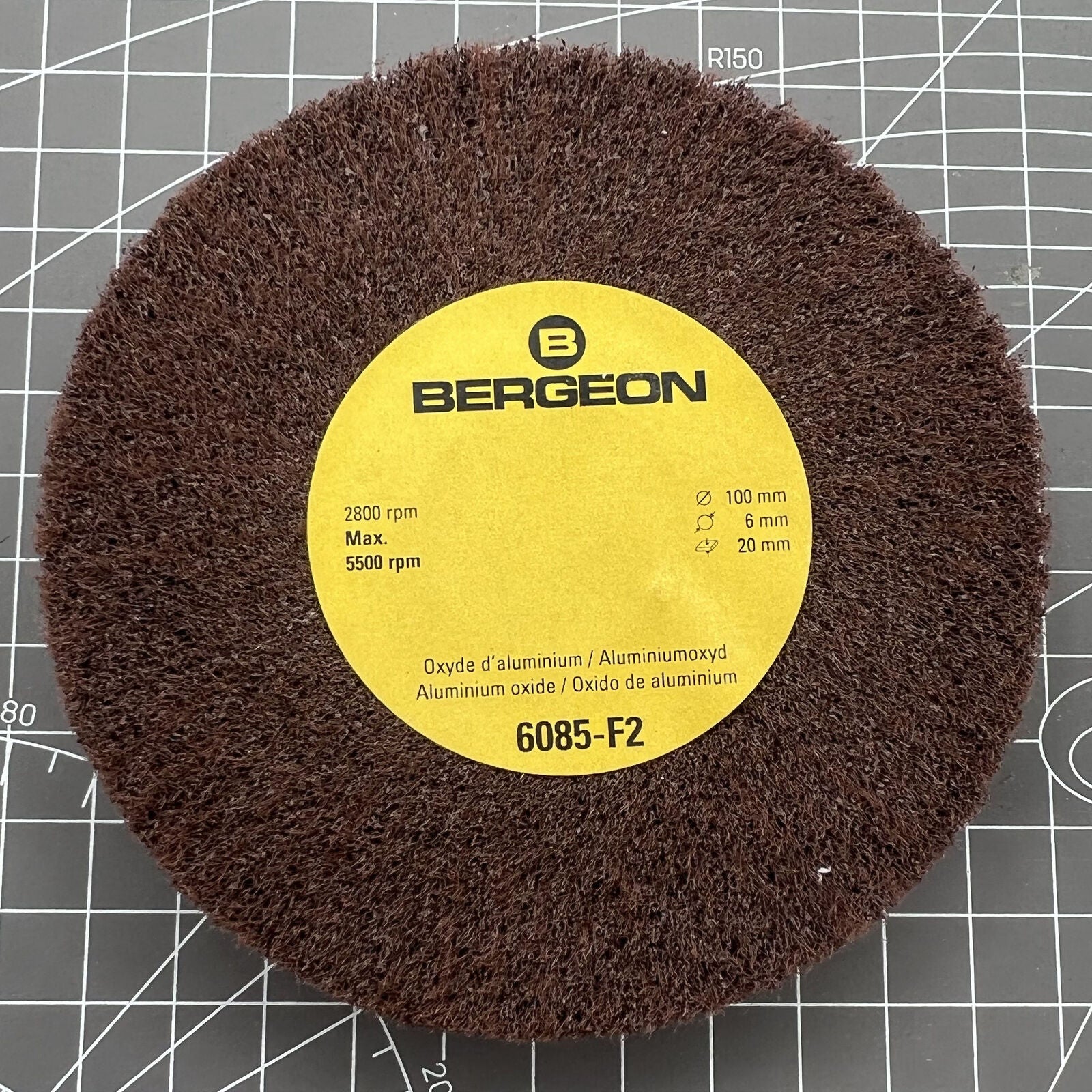 Swiss Bergeon 6085-F2 aluminum oxide polishing brush with fine grain wheels for watch accessory care.