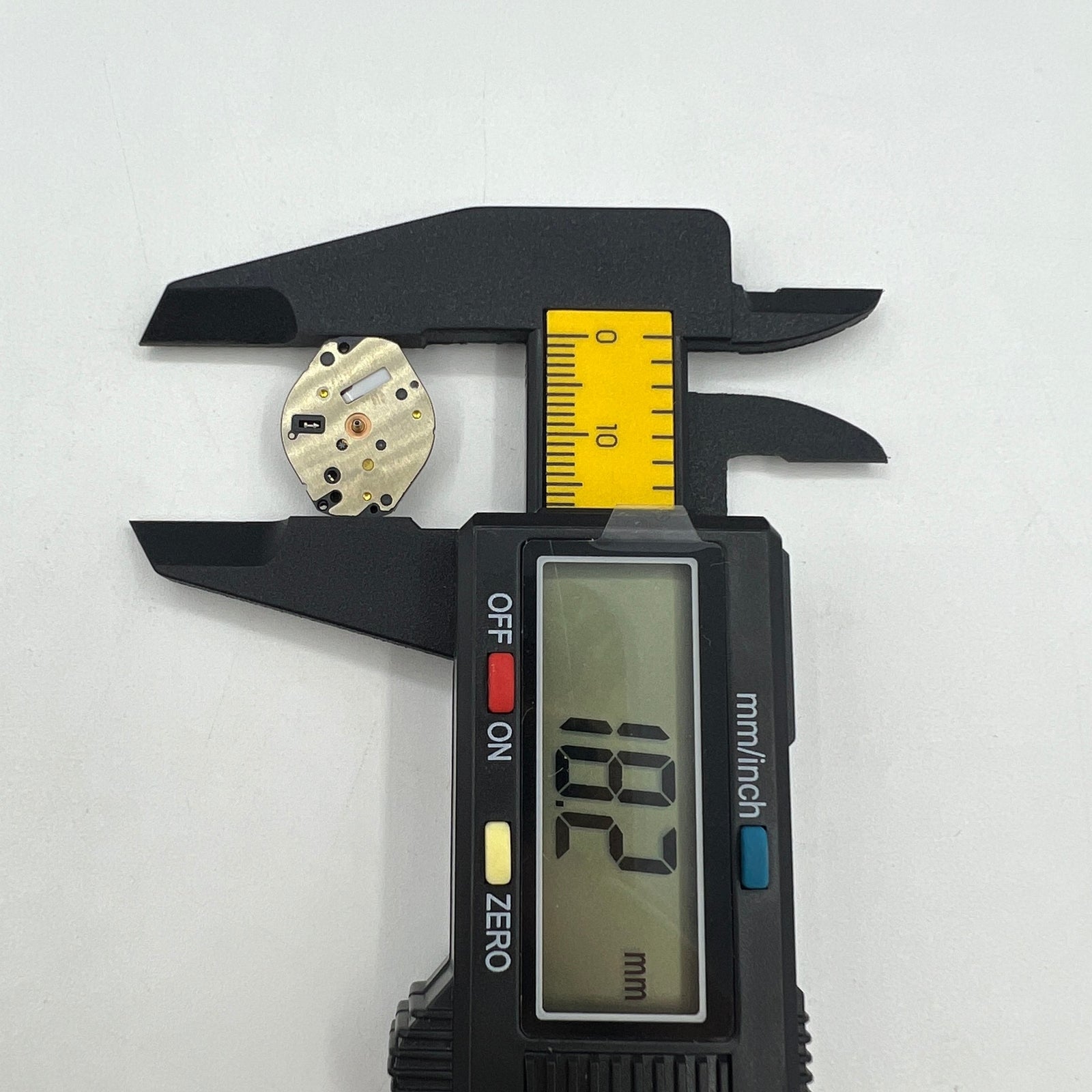 Hattori Epson TMI AL35E quartz watch movement, precise Japan-made mechanism for repair and customization.