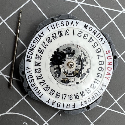 Hattori Epson TMI VJ55 quartz watch movement with date at 6, precision Japan-made component.