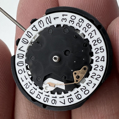Sunon PE81 quartz watch movement with 3 hands, date at 3, small seconds at 3, 6, and 9 positions