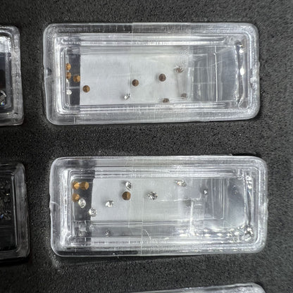 Set of 144 artificial glass stones in 12 sizes for watch dial and case decoration, enhancing style with quality craftsmanship.