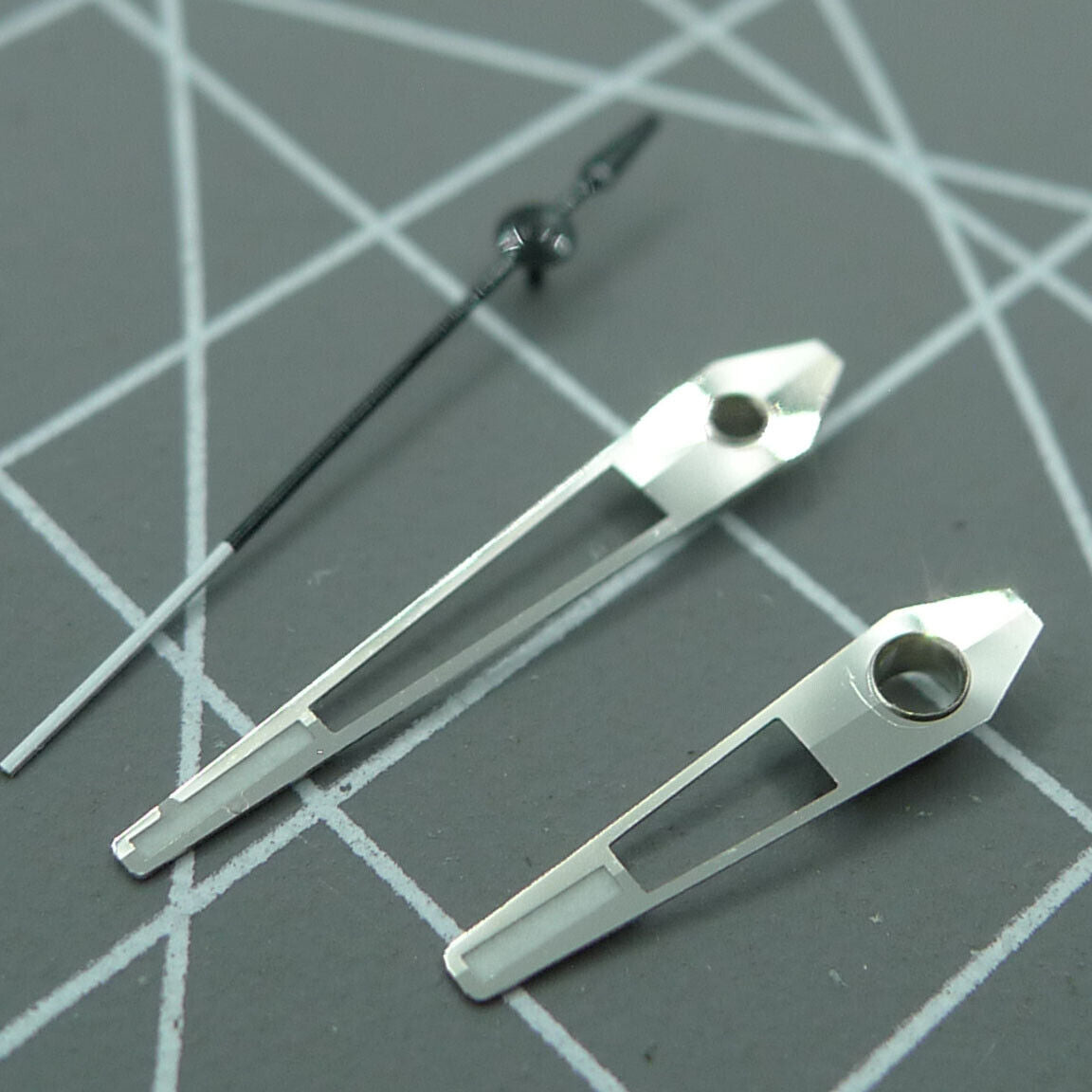 Green luminous watch hands with silver trim, designed for China Made 8215/2813 Miyota 8N24 movements, ideal for precise timekeeping.