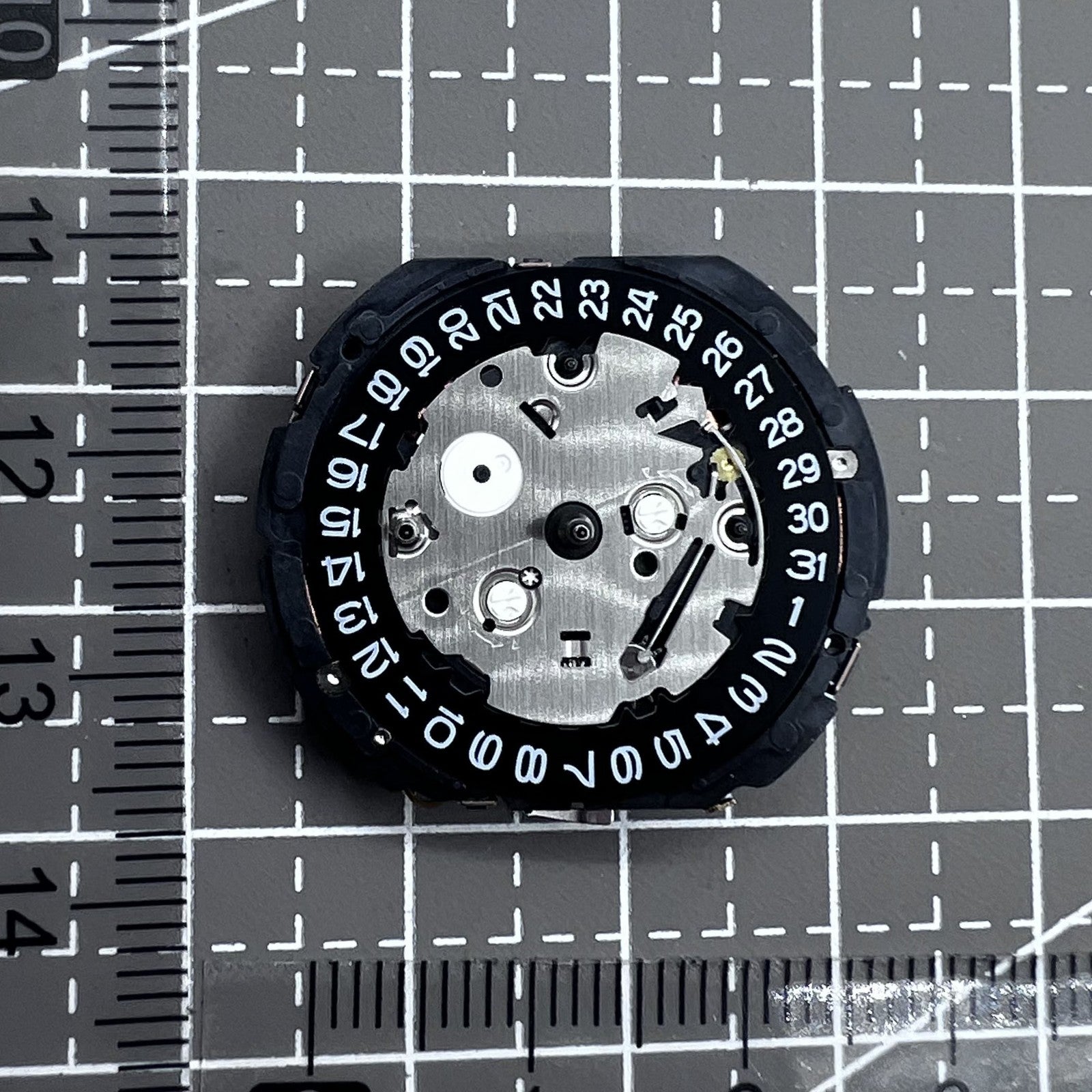 Close-up of Seiko 7T62A quartz movement showcasing precise Japanese craftsmanship in watch accessories.