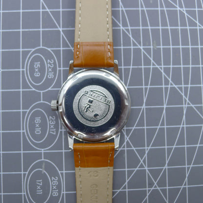 Beijing 36mm Double Rhomb watch with silver case, nail hour markers, and manual mechanical movement for accuracy.