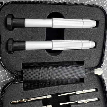Precision screwdriver set with hex tools for watches and glasses repair, ergonomic grip.