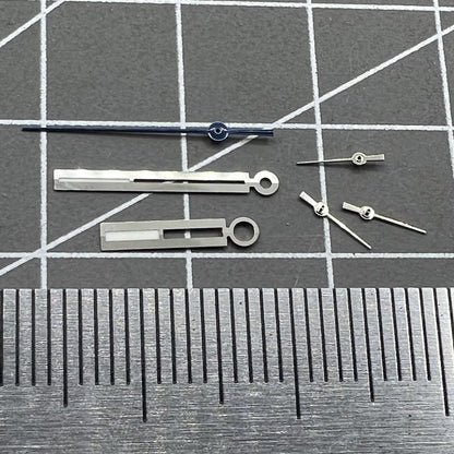 Luminous silver watch hands for Ronda 5021D quartz, perfect for accurate watch repair and upgrades.
