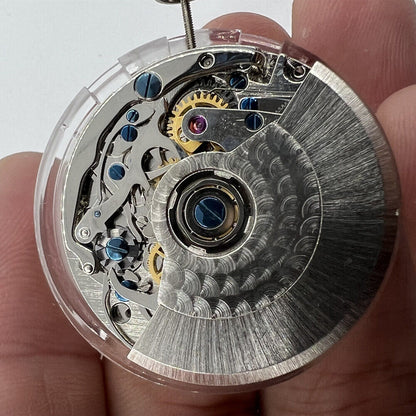 Tianjin Seagull ST1940 automatic watch movement showing small second dial, showcasing precise Chinese craftsmanship.