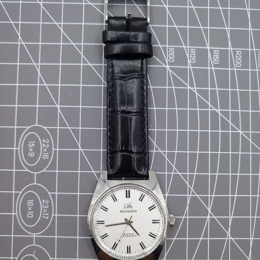 Shanghai Factory 38mm manual mechanical watch with white dial, 3 hands, 19 jewels, classic design.