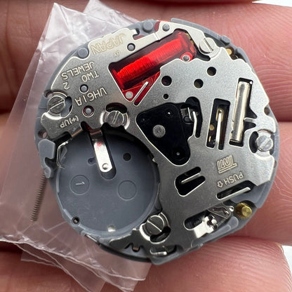 Hattori Epson TMI VH61A quartz watch movement, precise Japan-made repair part for watch accessories.