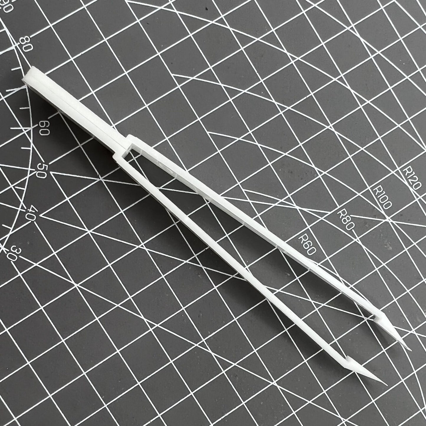 Bergeon 6460 Swiss Made plastic battery tweezer for precise watch battery handling and replacement.