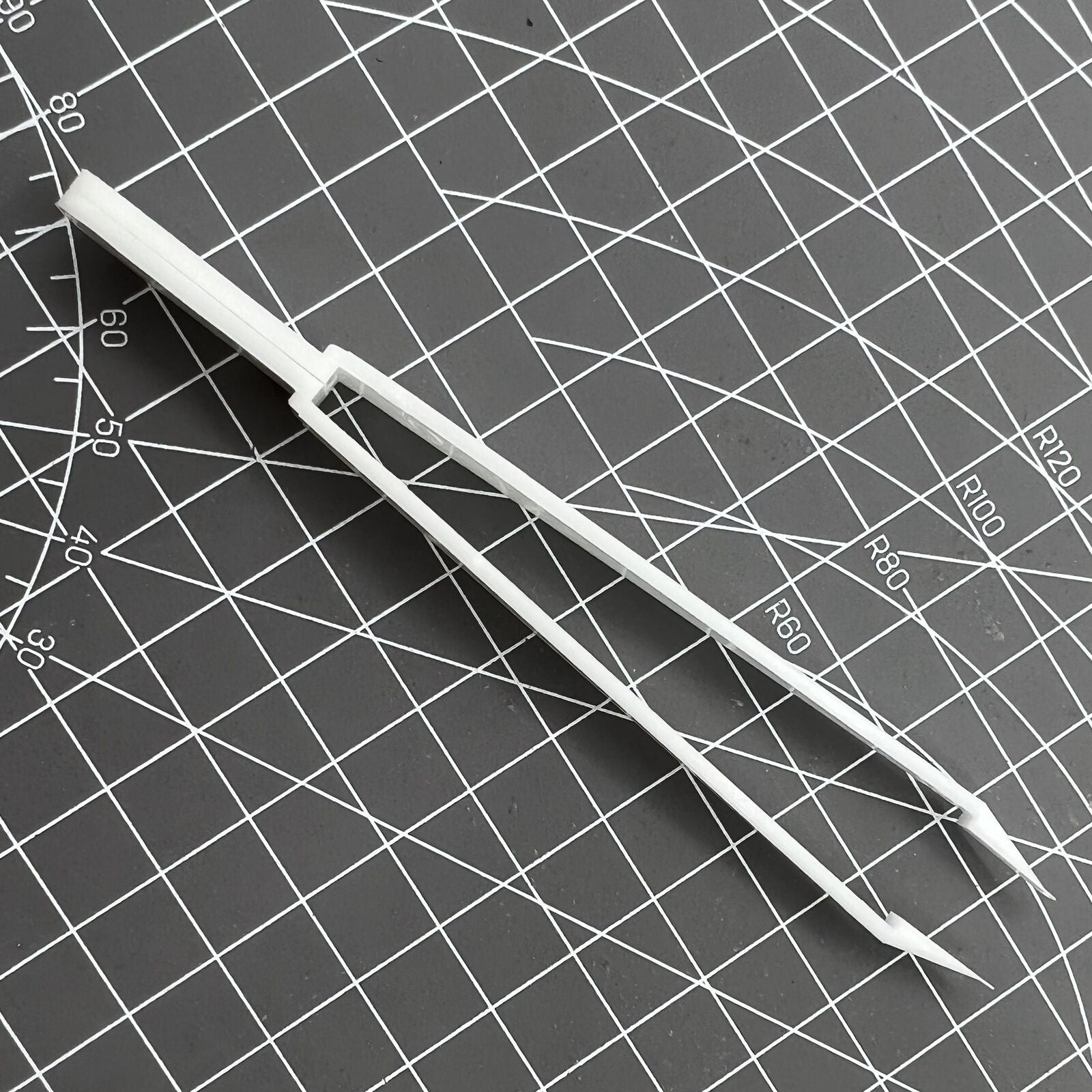 Bergeon 6460 Swiss Made plastic battery tweezer for precise watch battery handling and replacement.