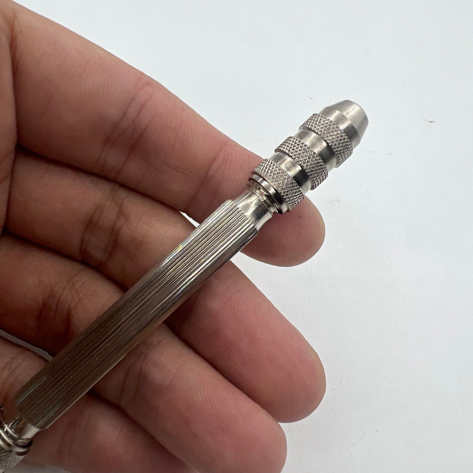 Swiss Bergeon 5679 Pin Vice watchmaker tool with adjustable openings for precise watch repair and assembly.