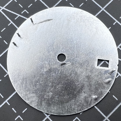 Silver 28.5mm watch dial with calendar, compatible with NH35/36 movement, precision-crafted for elegant timepieces.