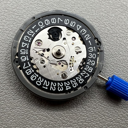 Japan NH35 automatic chronograph watch dial in black with date window and crown at 3 o?clock.