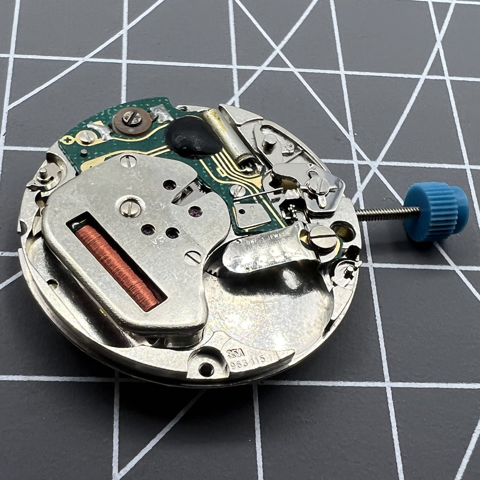 Swiss Made ETA 963.116 quartz watch movement with single calendar at 3 o'clock for accurate timekeeping.