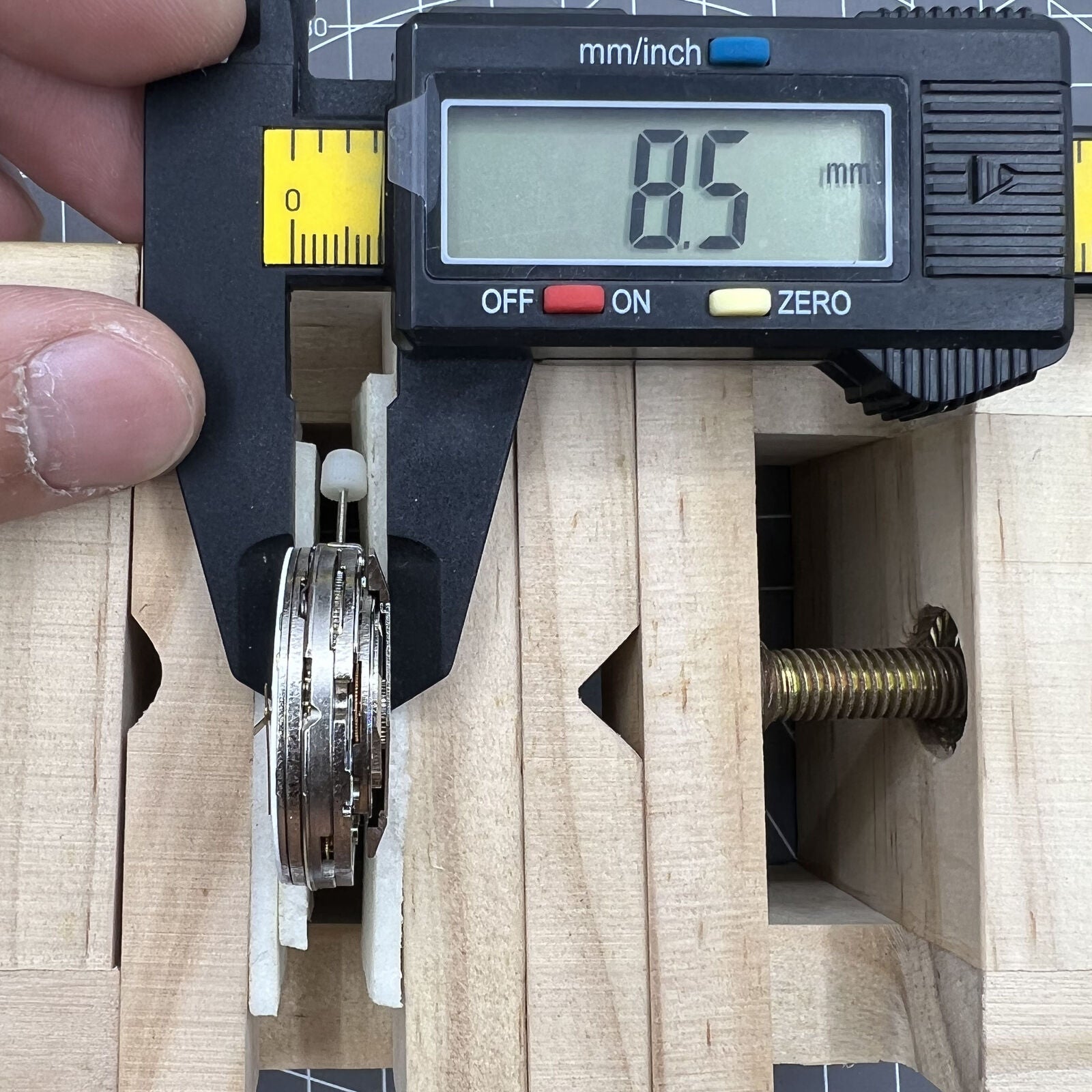 Automatic chronograph watch with ETA 7750, black dial, date at 4:30, sub-second at 9, precision timing.