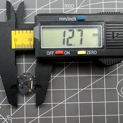 Epson TMI VX10A quartz watch movement with 2 hands, precise for reliable watch repairs and replacements.