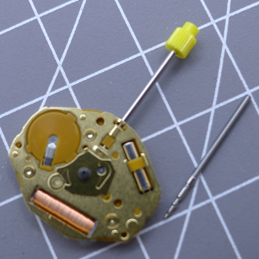 Close-up of Japan Made Miyota GL20 quartz watch movement with gold 2-hand design by Miyota.