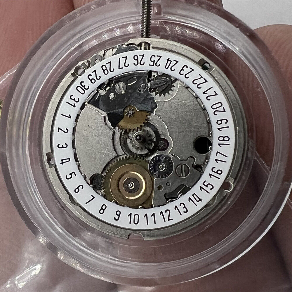 ETA 956.114 white dial quartz watch movement replacement with 3 hands by ETA, precise timekeeping accessory.