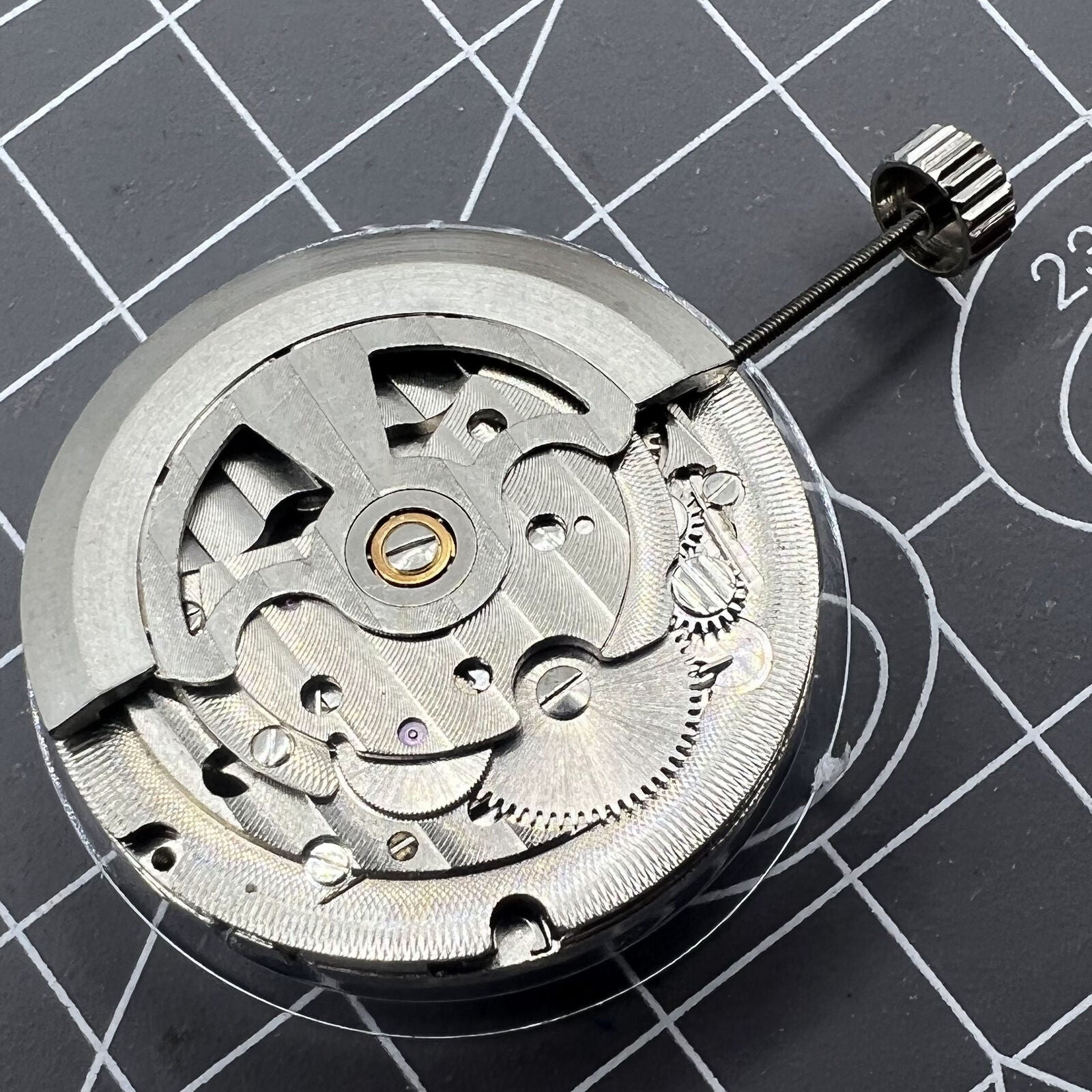 Dandong Silver Hollow Balance Wheel showcasing detailed automatic mechanical watch movement design.