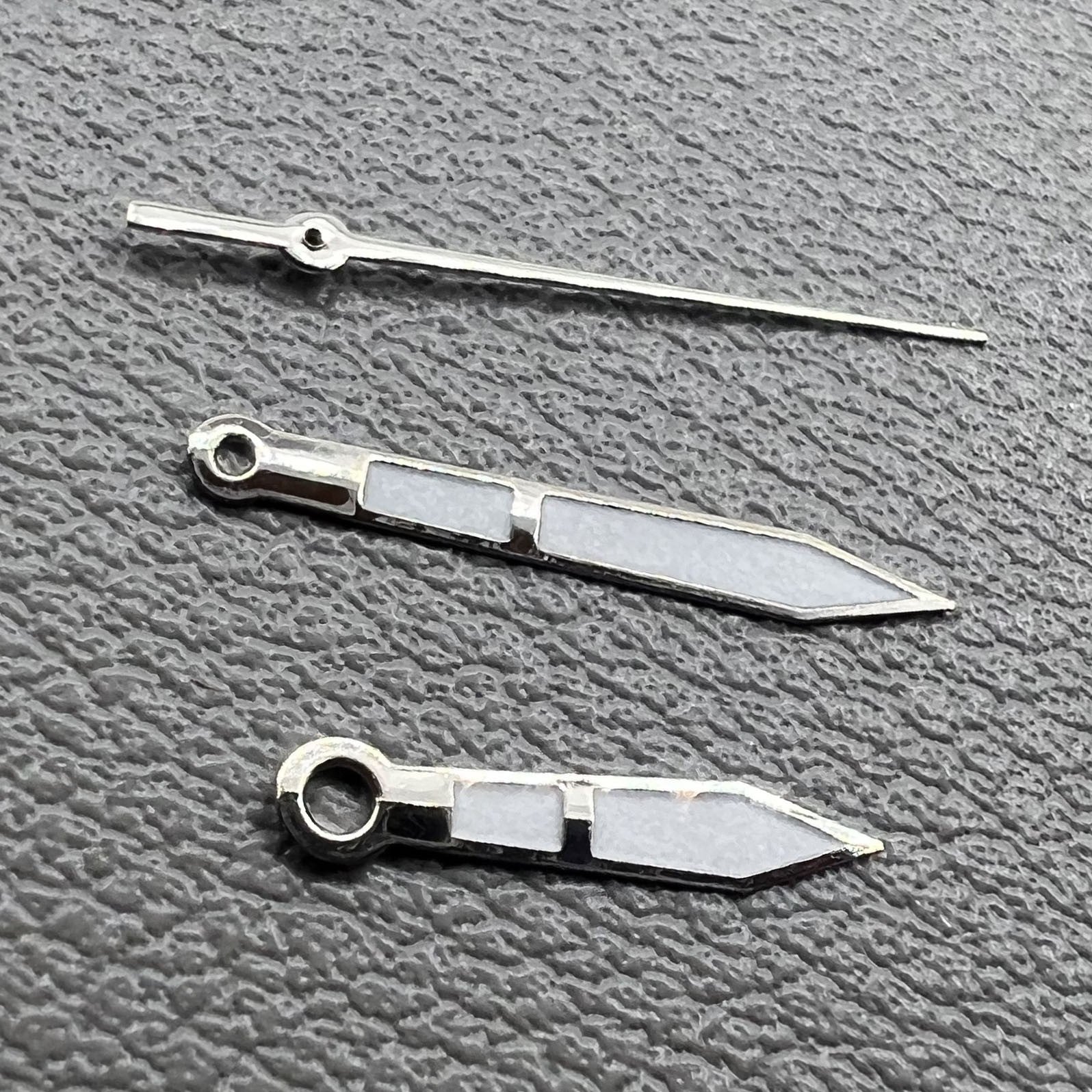 Green luminescent watch hands with silver trim, 10x14x14mm, compatible with Ronda 515.