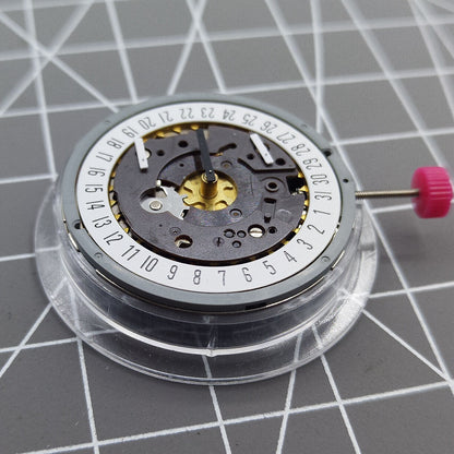 ISA 8162 quartz watch movement with date at 6, precise replacement for watch repair and timekeeping.
