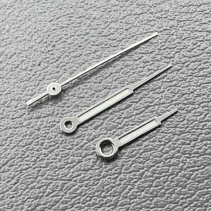 Set of silver trim green lume pointed hands for Ronda 515 watch movement, perfect for precise time reading.