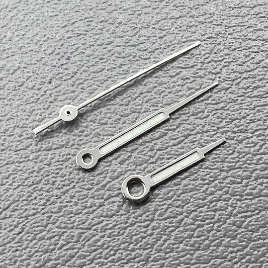Set of silver trim green lume pointed hands for Ronda 515 watch movement, perfect for precise time reading.