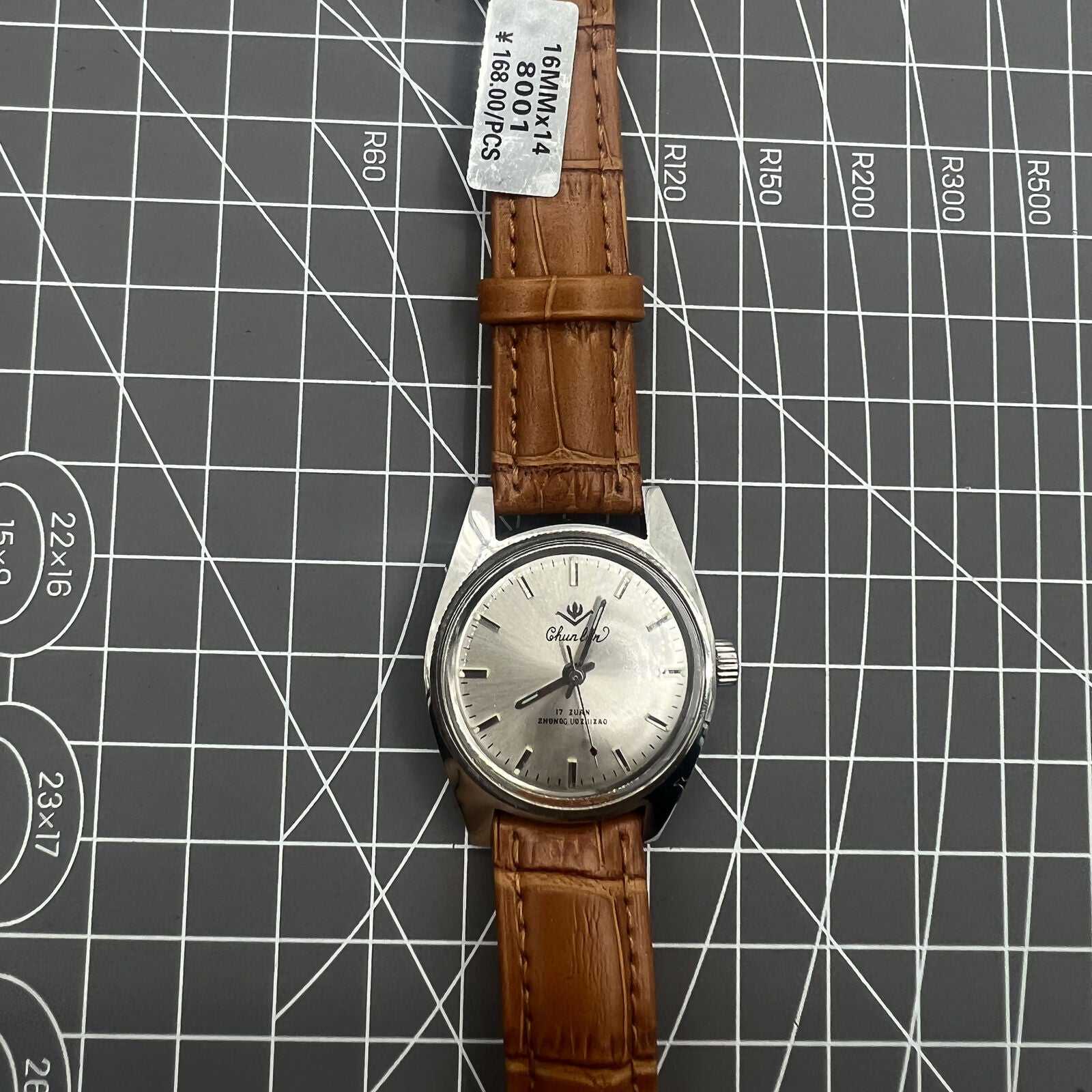 Chunlan 32mm manual watch with silver dial and precise 17 jewel mechanical movement.