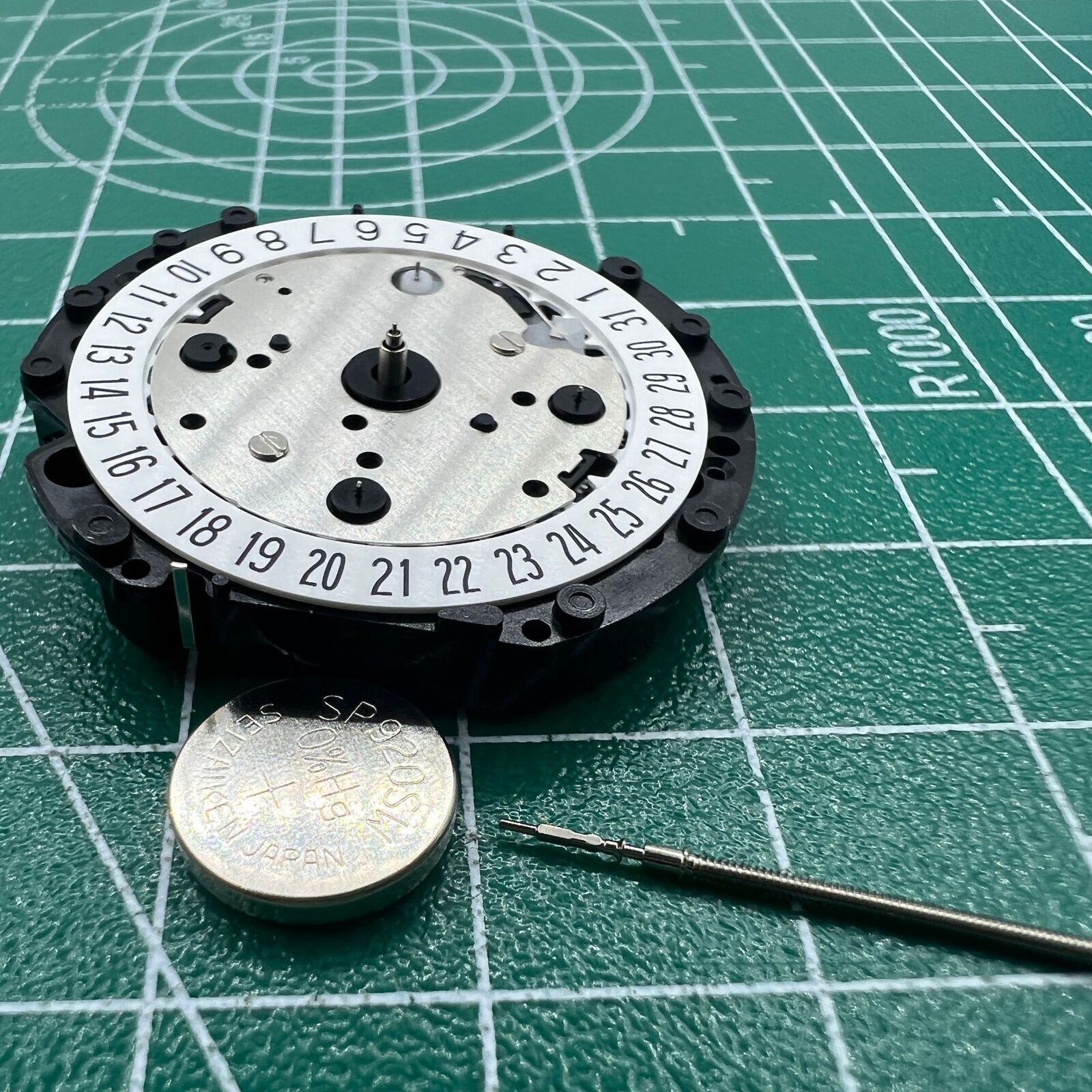Hattori Epson TMI VD53C quartz watch movement with date window at 6 o'clock for precise timekeeping.