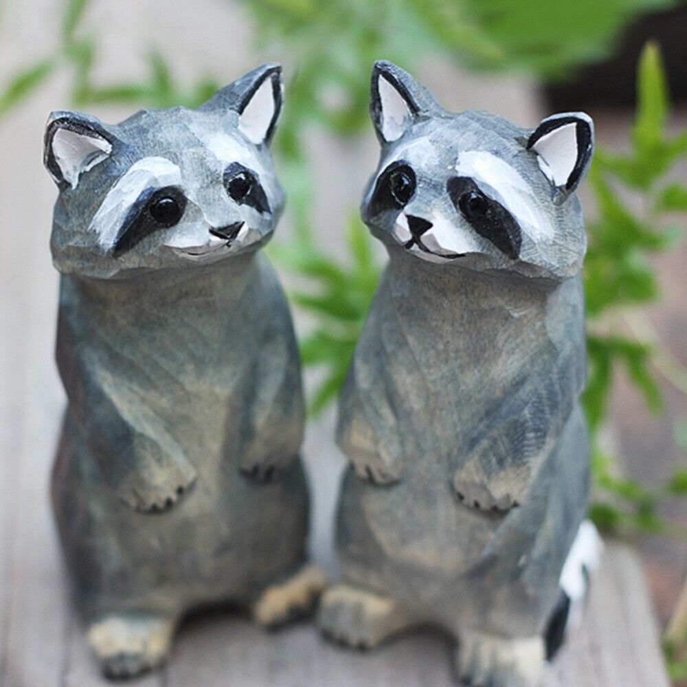 Handcrafted raccoon wooden figurine, charming decorative artwork for home or office display.