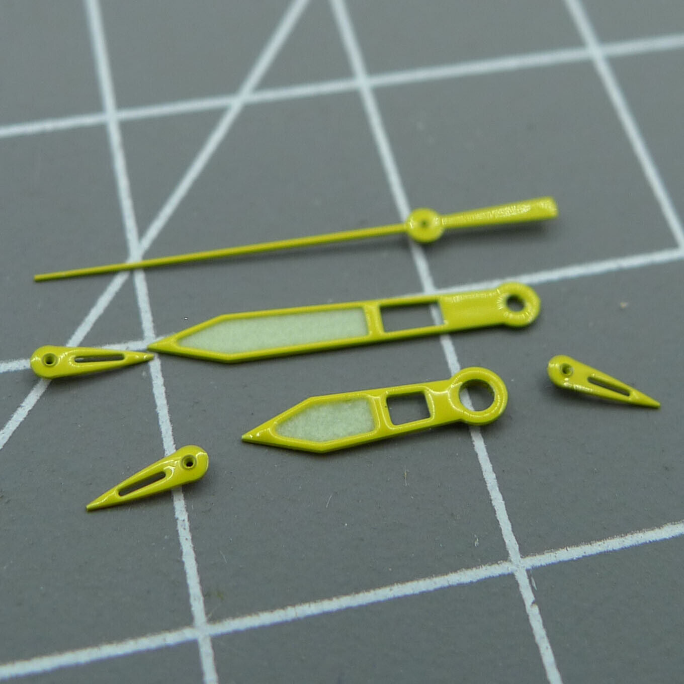 Yellow-trimmed green luminous watch hands compatible with Miyota OS10 movements.