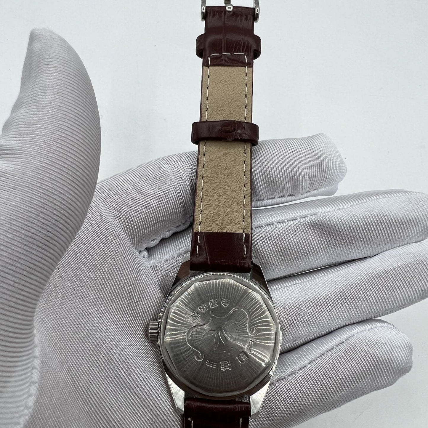 HONGLIAN 32mm manual mechanical watch with 17 jewels, Roman numeral dial, elegant classic design.