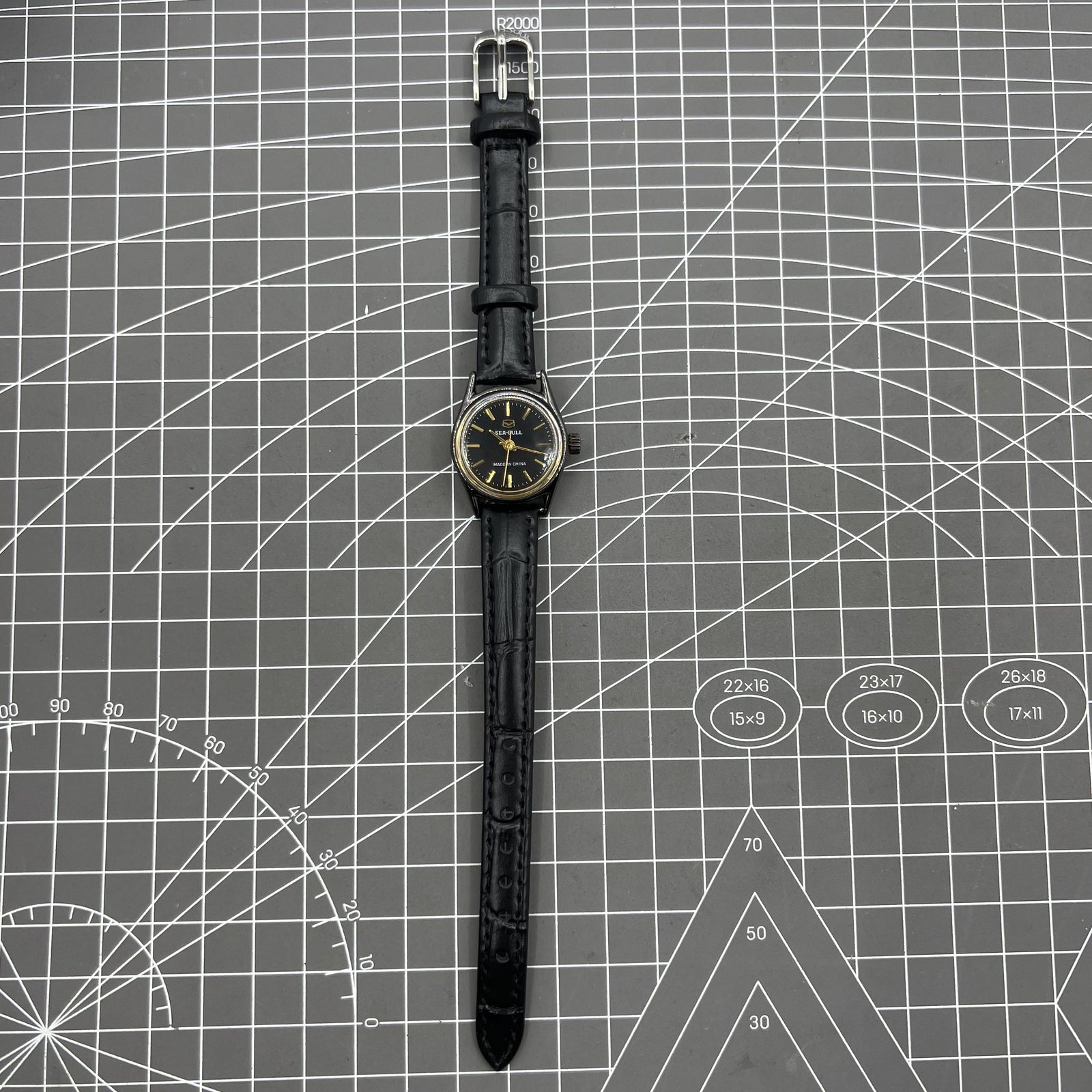 27mm Tianjin Seagull ladies watch with manual mechanical movement and golden nail markers.