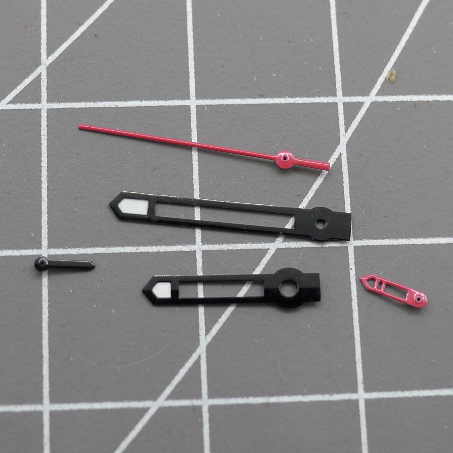 Black-trimmed red second hand for Hattori Epson VD53 quartz watch movement, precise accessory.