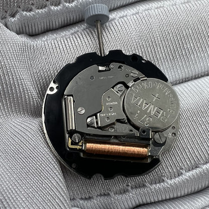 Swiss Made Ronda 705 quartz watch movement with date windows at 3 and 6 o'clock, precise timekeeping for accessories.