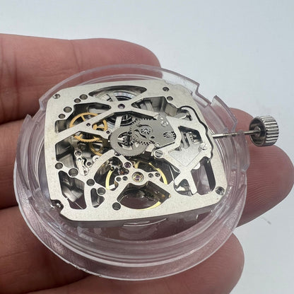 Tianjin Seagull ST25 automatic mechanical square watch movement, silver with 3 hands and hollow design.
