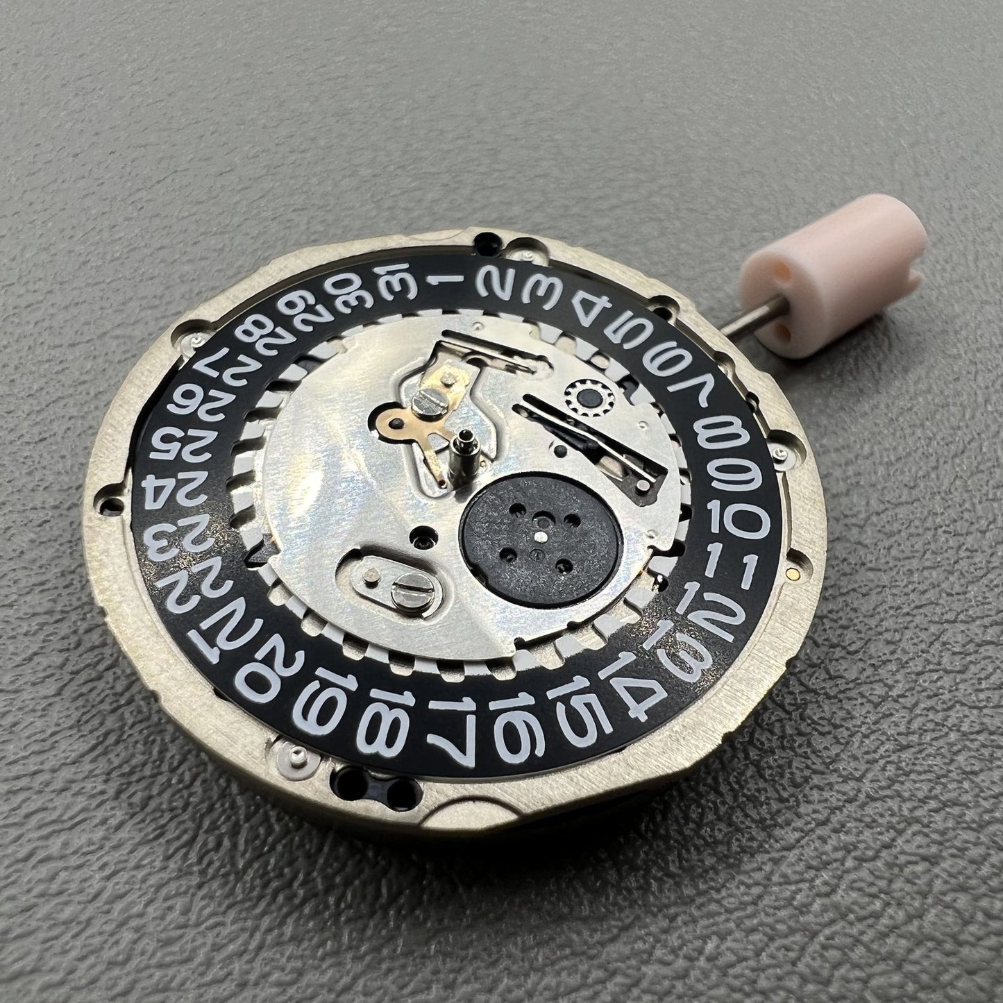 Seiko 5J32A quartz watch movement with black disk and single calendar, precise timekeeping accessory
