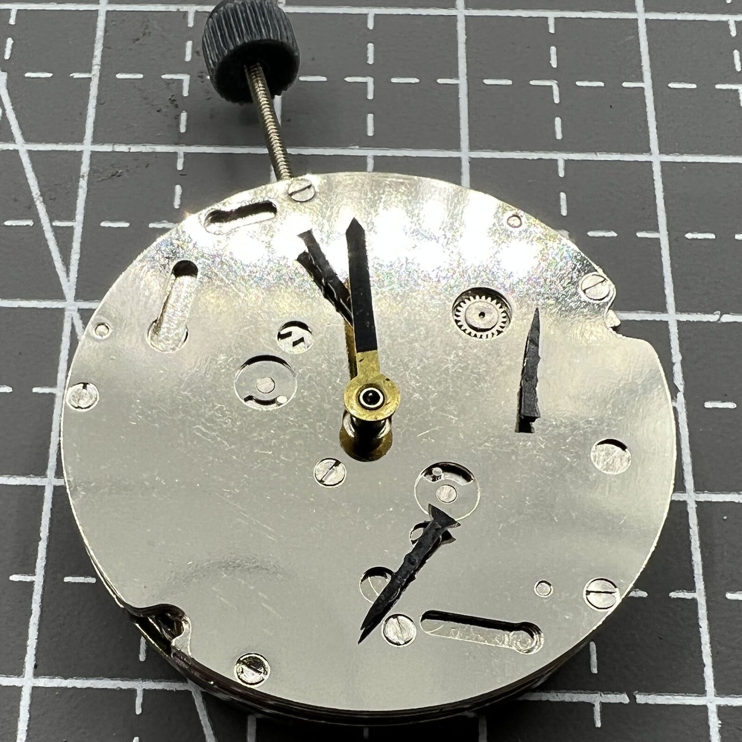 DG2813 automatic watch movement showing three large hands and small seconds at 6 o'clock, no calendar feature.
