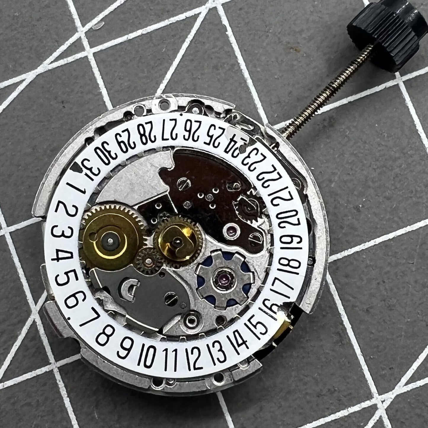 Swiss ETA 204.911 mechanical watch movement by ETA, featuring automatic winding for precise timekeeping.