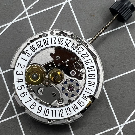 Swiss ETA 204.911 mechanical watch movement by ETA, featuring automatic winding for precise timekeeping.
