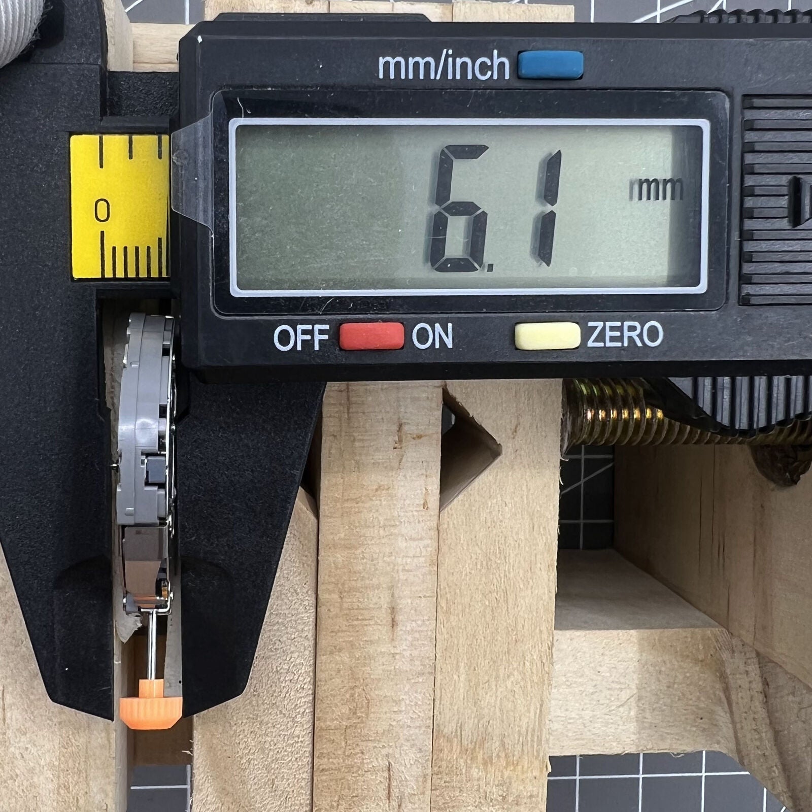 Japan Miyota JS10 quartz watch movement featuring small seconds at 6, 9, and 12 o?clock positions for precise timekeeping.