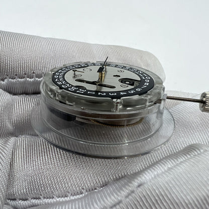 Swiss Made ETA C01.211 chronograph movement with 1853 black dial showcasing precision and luxury.