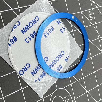 Blue 38mm/31.5mm aluminum watch bezel insert with numerals, durable accessory for precise time tracking.